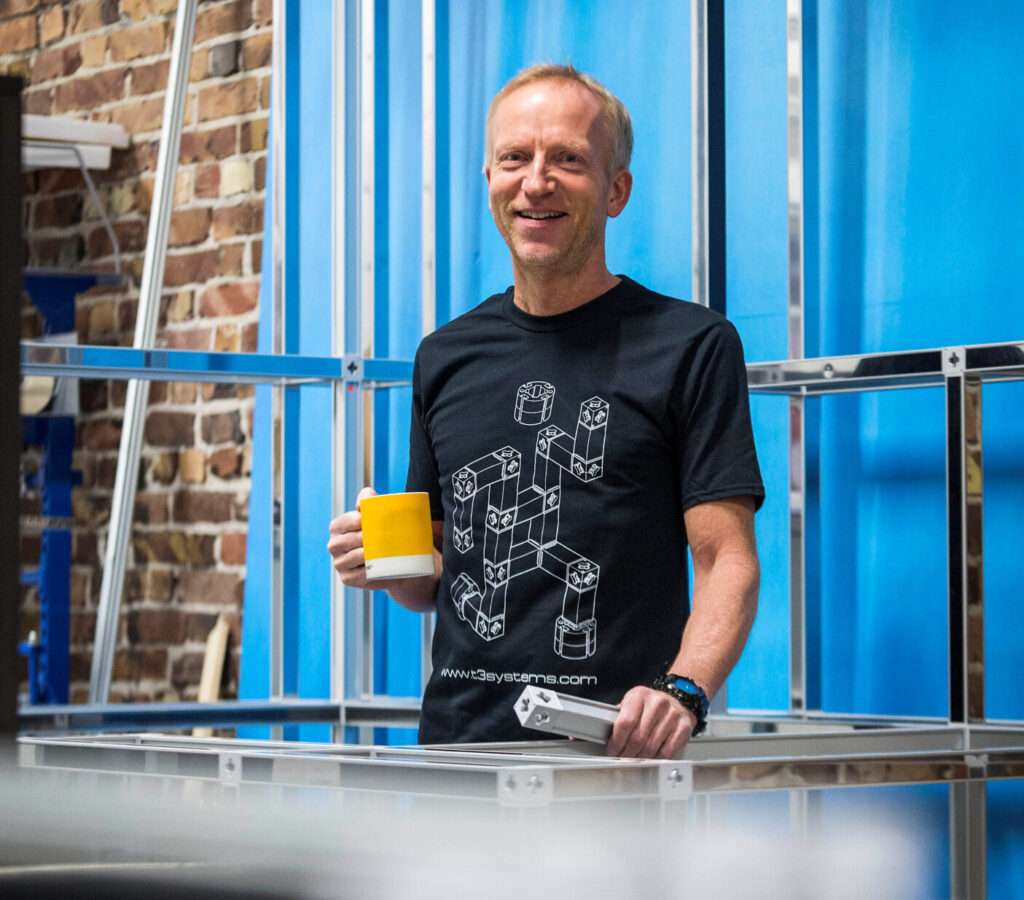 Happy T3 customer in our branded T3 T shirt.
