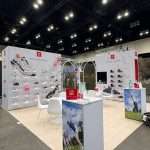Wide-angle view of completed Duca del Cosma modular exhibition booth at PGA Show Orlando